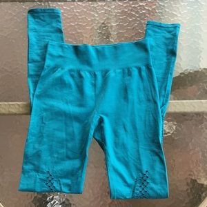 Fabletics teal leggings with cutout on legs